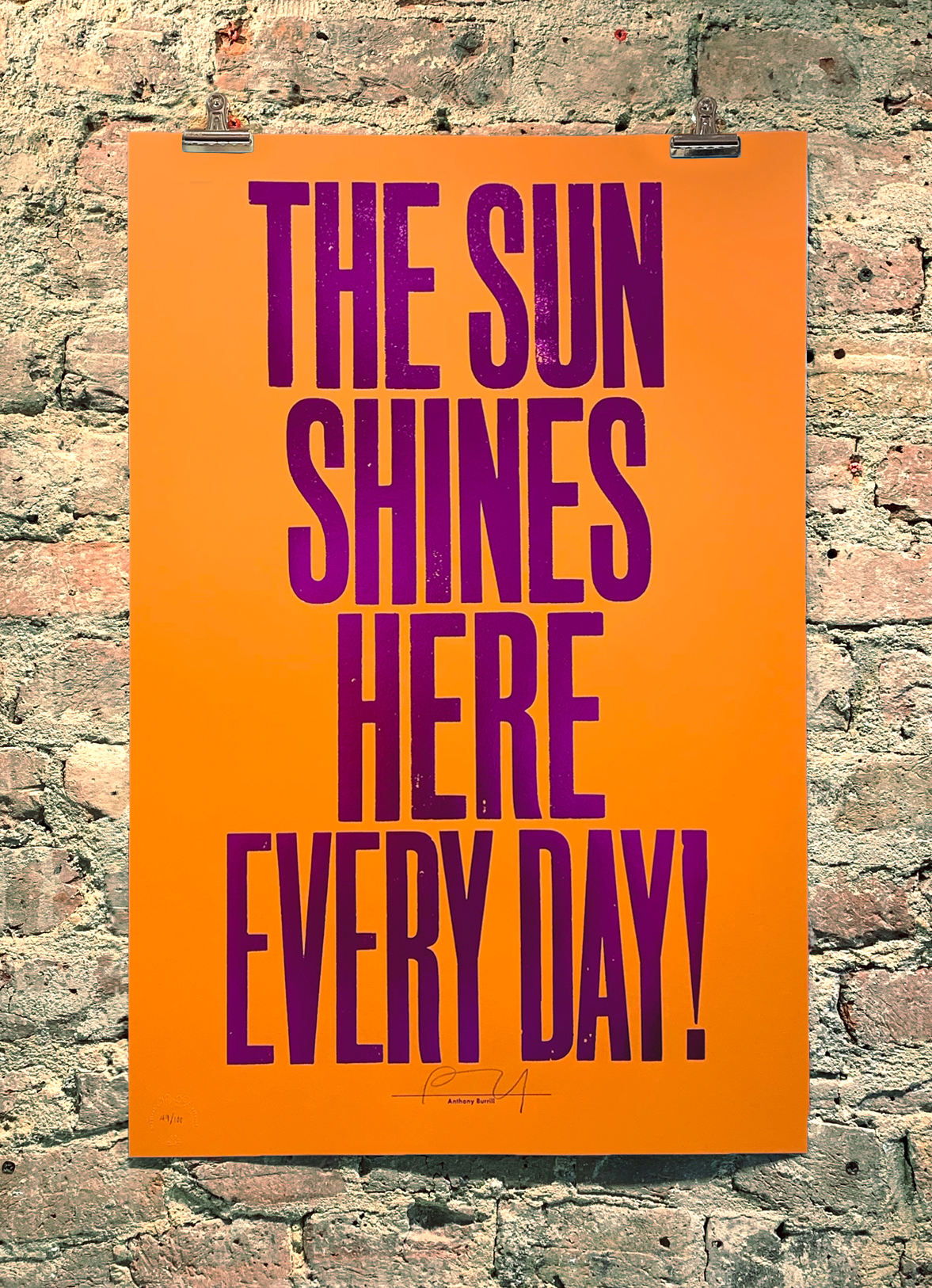 The Sun Shines Here Everyday - Orange (A/P) by Anthony Burrill