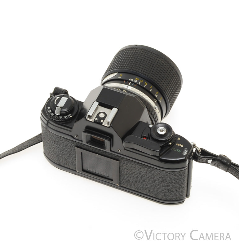 Nikon EM Black 35mm Film Camera with Nikon E Series 36-72mm Zoom Lens
