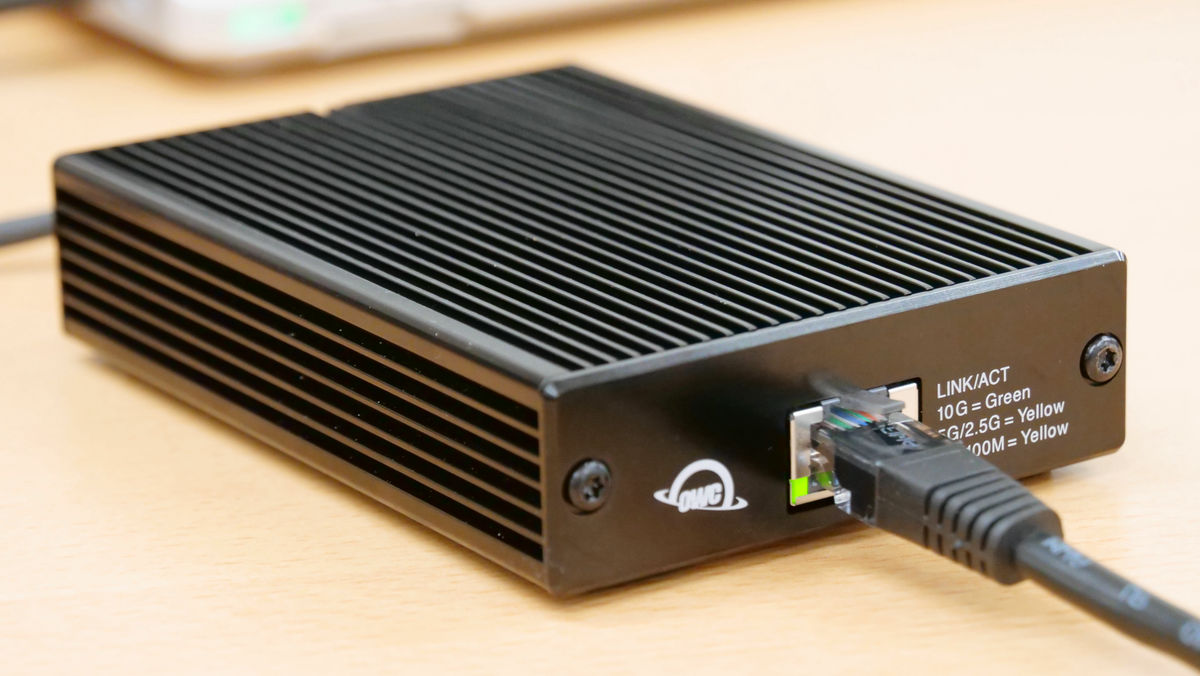 OWC Thunderbolt 3 10G Ethernet Adapter' that connects the 10 Gbps